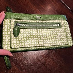 A Green Coach Wristlet